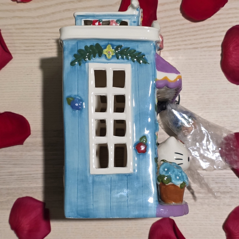 NWT Sanrio Hello Kitty Ceramic Floral Garden Shop Candle House - Picture 2 of 15